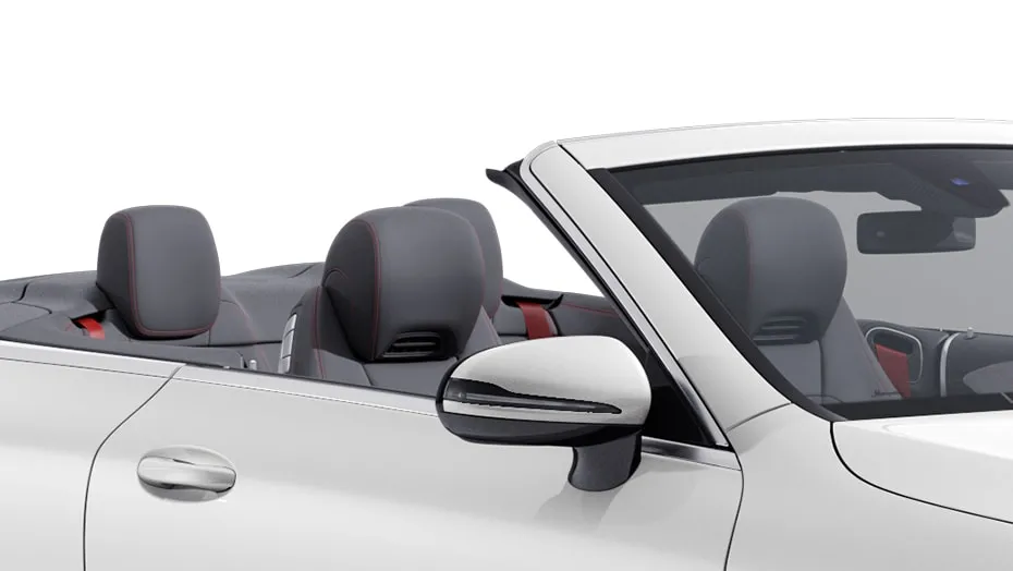 Front sport seats with integrated head restraints